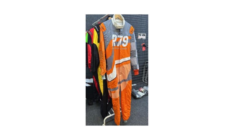 OWN YOUR VERY OWN CUSTOM FIA APPROVED RACING SUIT AND HELMET