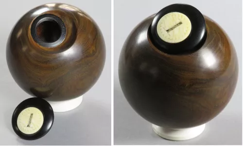 Re-turned from: A green lawn bowling ball.