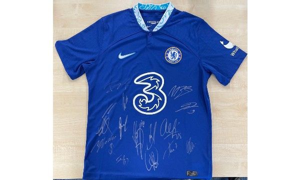 Two VIP Chelsea FC Tickets, Men’s First Team Signed Shirt and Chelsea FC Women’s Signed Football